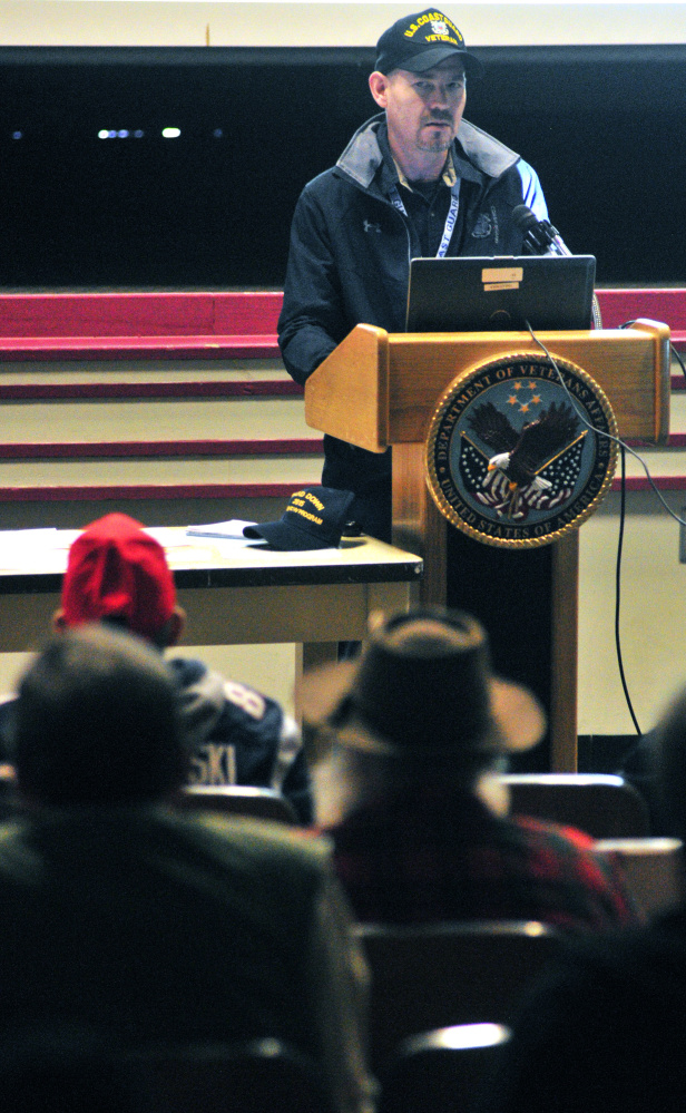 Coast Guard veteran Aaron Brooker, who was homeless two years ago, speaks at the start of the 18th annual Homeless Veterans Stand Down on Saturday at VA Maine Healthcare System-Togus.
