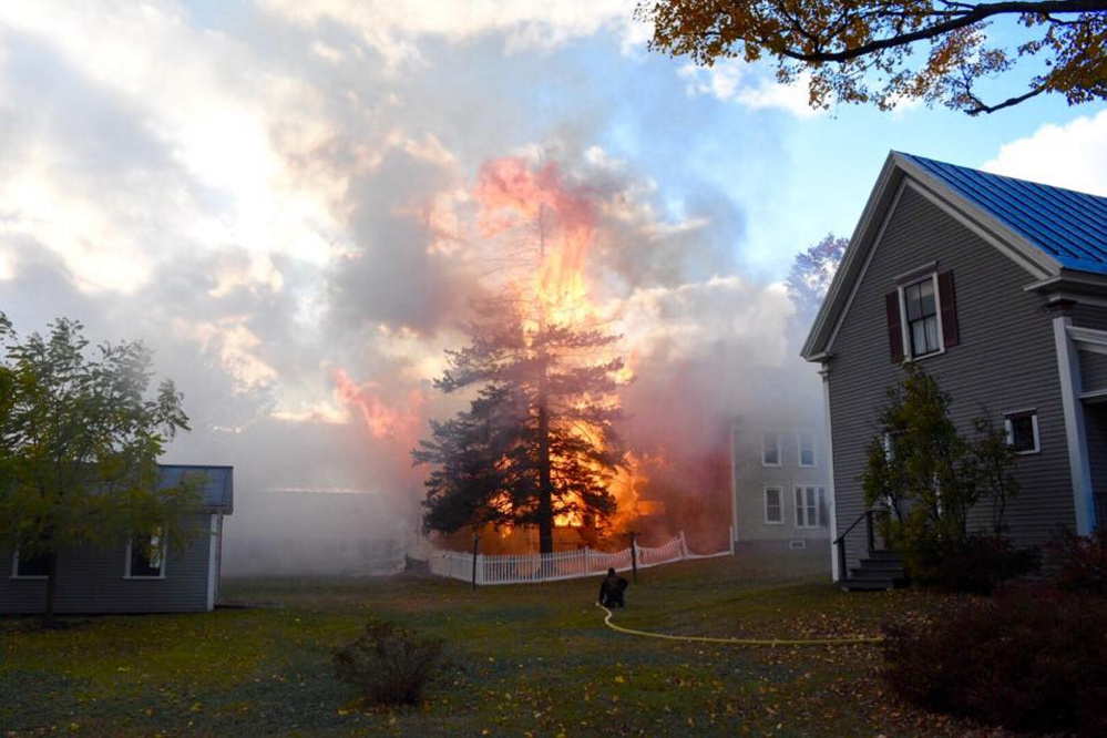 Firefighters respond to a barn fire in Bingham on Sunday afternoon.