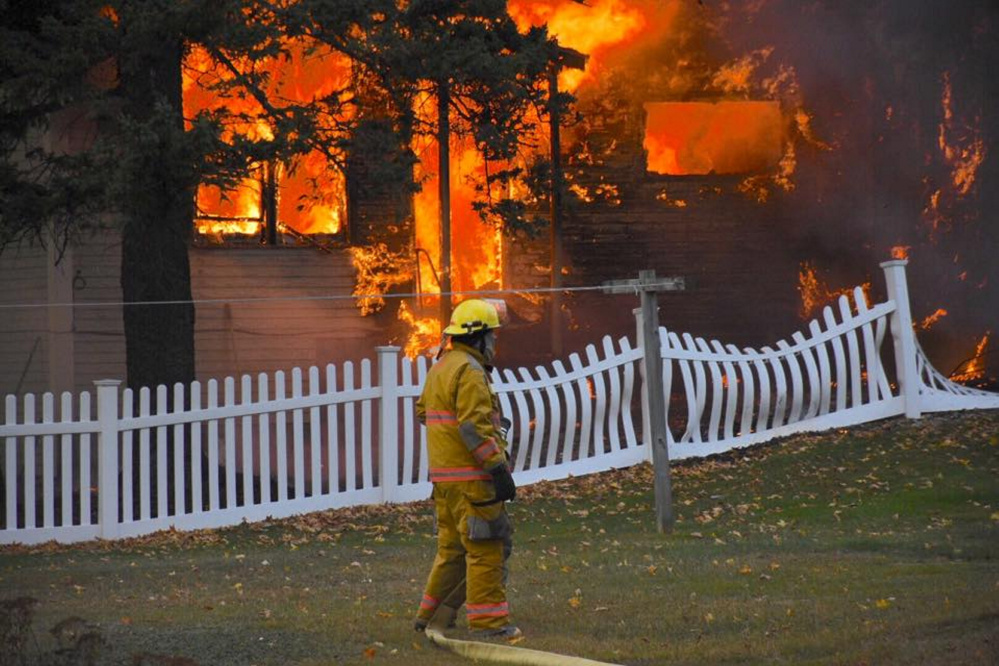 Firefighters respond to a barn fire in Bingham on Sunday afternoon.