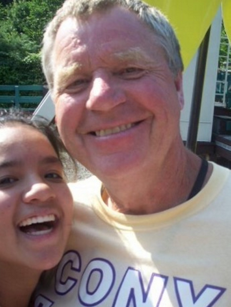 Former Cony student-athlete Elizabeth Dang, now 20 and a junior at the University of Louisville, poses with coach Taylor Harmon. Harmon, a longtime indoor track and field coach at Cony and mentor to many student-athletes, died Sunday.