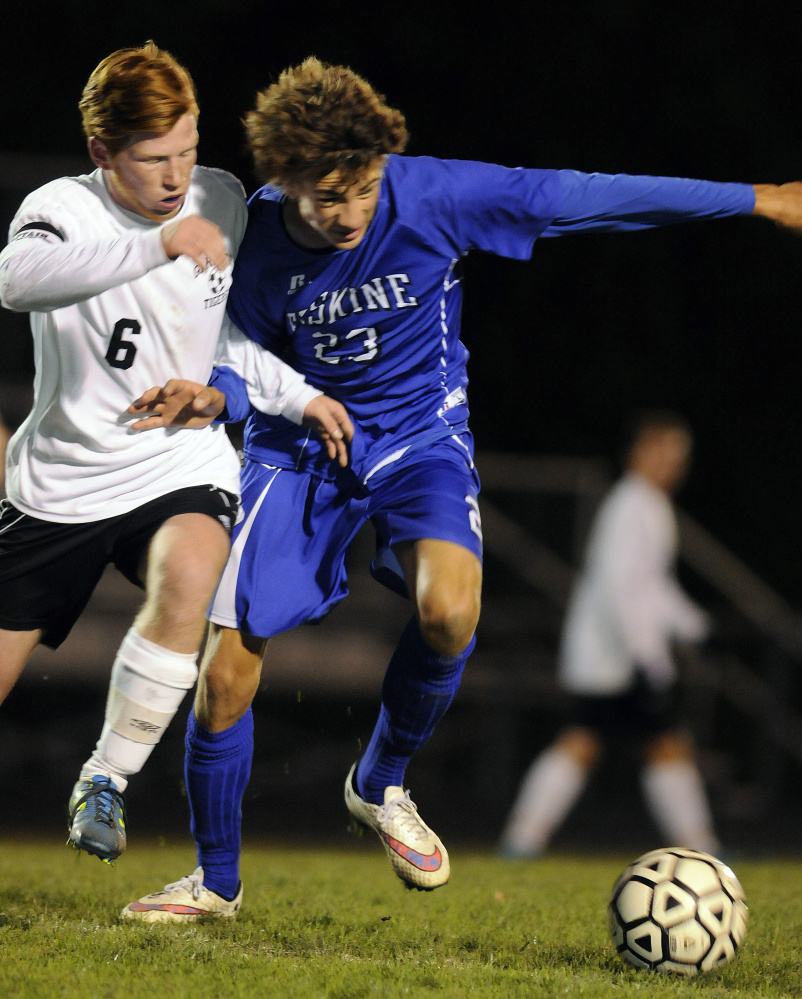Staff photo by Andy Molloy 
Gardiner's Peter Del Gallo, left, battles Erskine's Grayson Petty for possession during a Kennebec Valley Athletic Conference Class B game Monday night in Gardiner. The Eagles won, 4-2.
