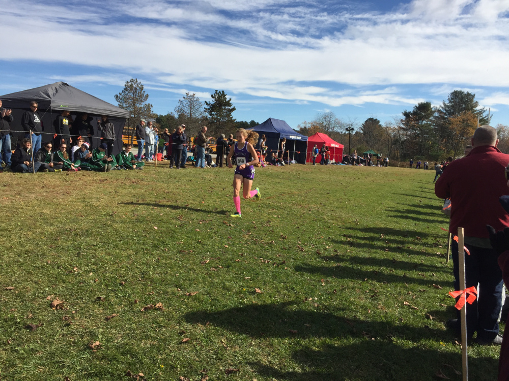Staff photo by Randy Whitehouse 
 Waterville senior Lauren Brown runs during the Class B North cross country championships Saturday at Troy Howard Middle School in Belfast. Brown won with a time 19:01.29.