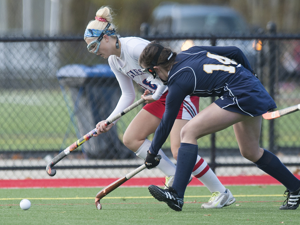 Kevin Bennett photo 
 Messalonskee’s Nathalie St. Pierre, left, and Mt. Blue’s Gracie Foss look to gain control of the ball during the first half Saturday.