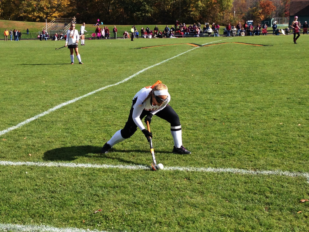 Staff photo by Evan Crawley 
 Winslow's Ciera Poulin looks to get the ball up the field during a Class B North semifinal game against Foxcroft on Saturday in Winslow.