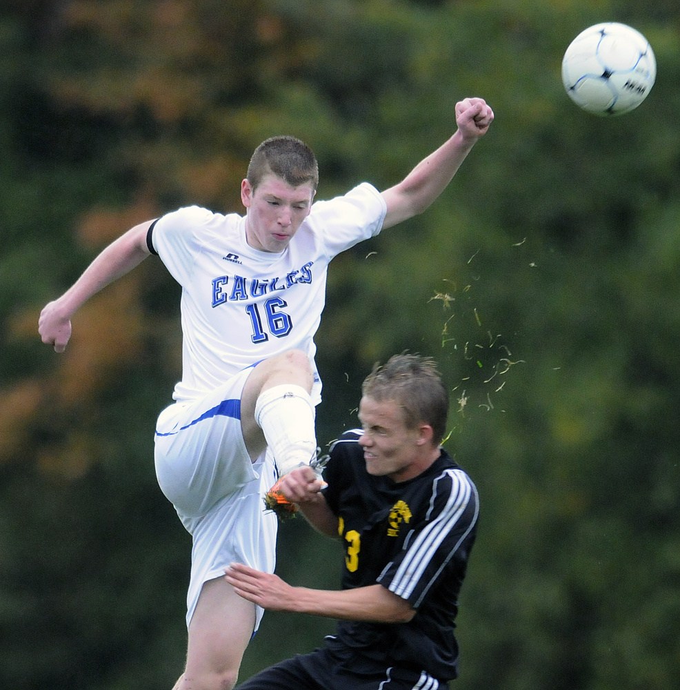 Staff photo by Andy Molloy 
 Maranacook's Sam Wilkinson, right, makes contact with Erskine's Caleb Barden during a game earlier this month in South China. Both teams will play quarterfinal games Wednesday. Erskine will play at Winslow in a Class B North game while Maranacook will entertain Fryeburg in a Class C South game.