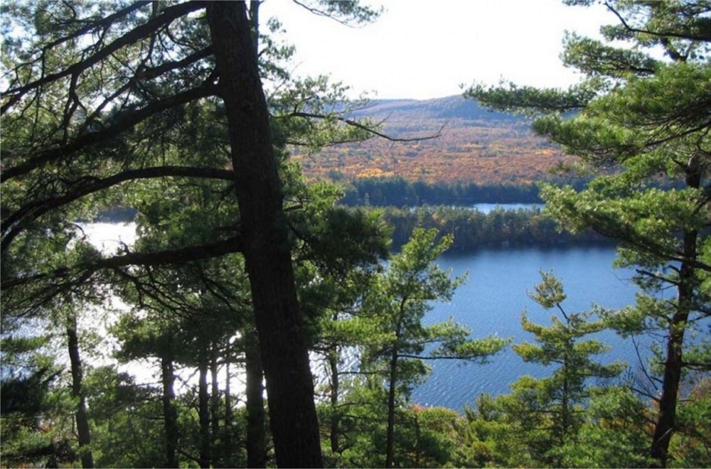 Contributed Belgrade Regional Conservation Alliance photo
The view from The Mountain in Rome, which overlooks both Great and Long ponds. A plan for a cellphone tower on the summit, which is the site of a popular hiking trail, has spurred lawsuits that have depleted the town’s legal fund.