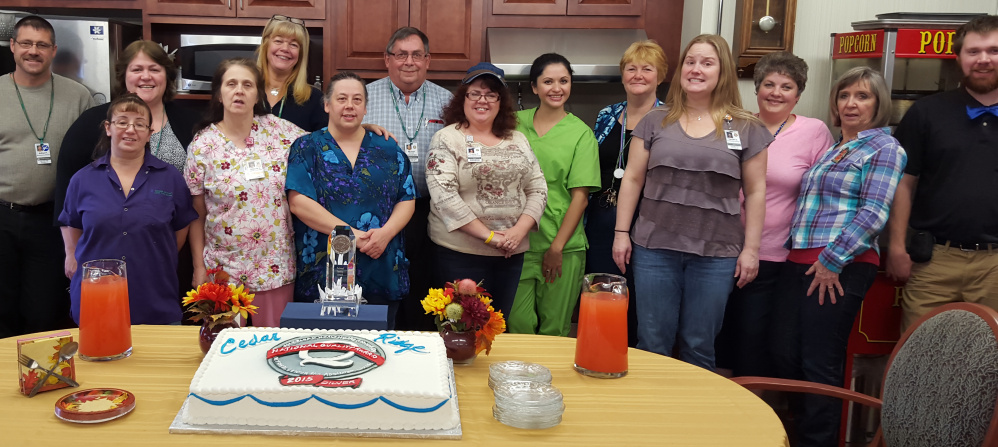 Front, from left, are Tina Wright, cook; Vanessa Anton, nurse’s aide; Mary Girard, nurse’s aide; Crystal Perkins, receptionist; Rachael Guilford, staffing manager; Mary White, food service supervisor; and Logan Shepherd, housekeeping manager. Back, from left, are Art Perkins, maintenance supervisor; Janet McCollar, MDS coordinator assistant; Susan Russell, director of nursing; Mike McDougall, administrator; Mellisa Mendez, LPN; Donna Noyes, RN; and Rhonda Pullyard, ward clerk.