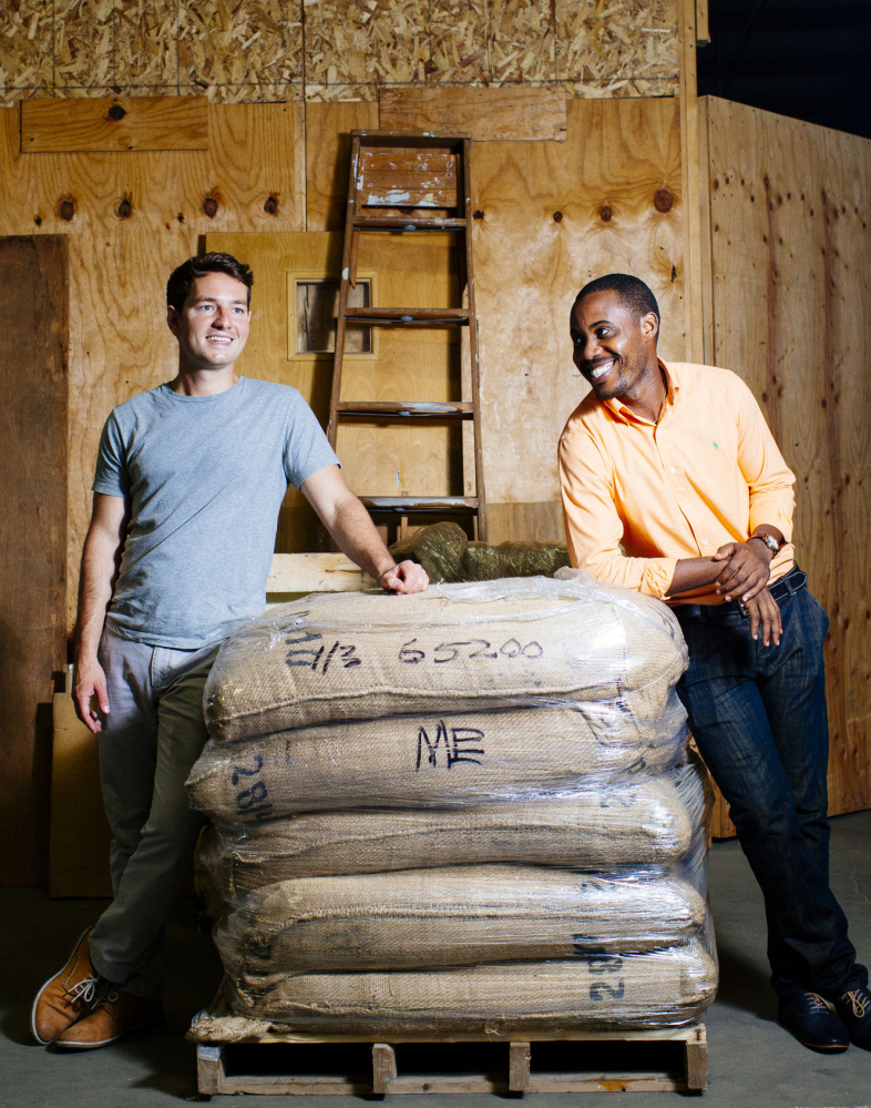 Rwanda Bean Co. founders Nick Mazuroski, left, and Mike Mwenedata aim to make a difference in the East African nation of Rwanda, where Mwenedata fled genocide.