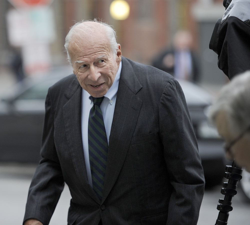 Russell “Rusty” Brace of Camden smiles at the media as he heads into U.S. District Court in Portland for his sentencing Friday.