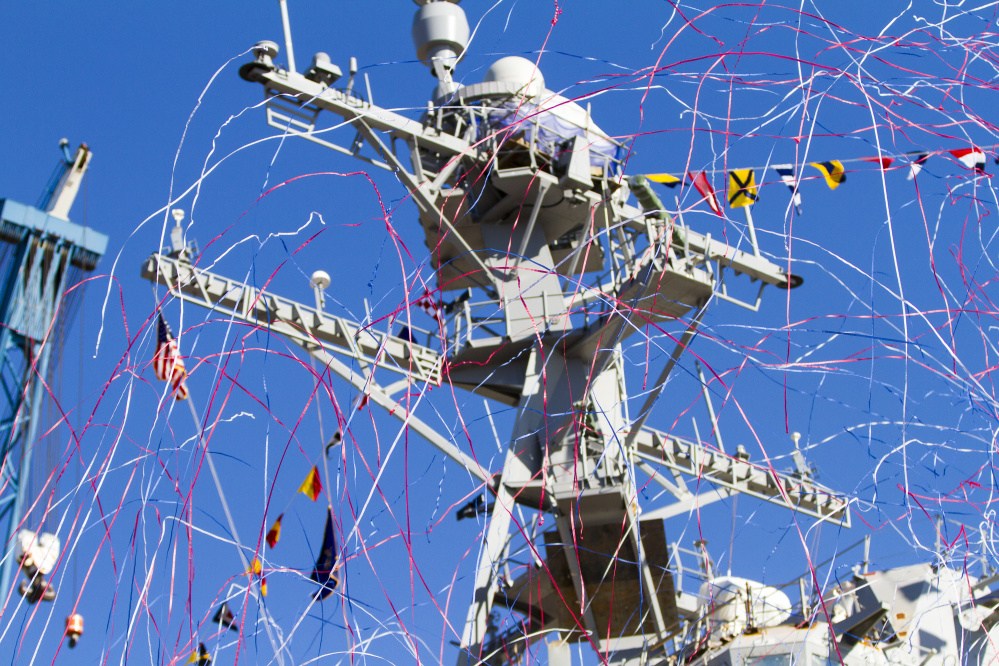 Streamers fly alongside the USS Rafael Peralta after its christening Saturday at Bath Iron Works.
Ben McCanna/Staff Photographer
