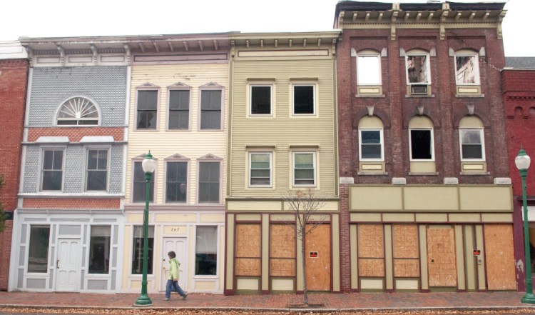 This October photo shows sky visible through windows because of the collapsed roof on 235 Water St. in Gardiner that was heavily damaged by a fire in July.