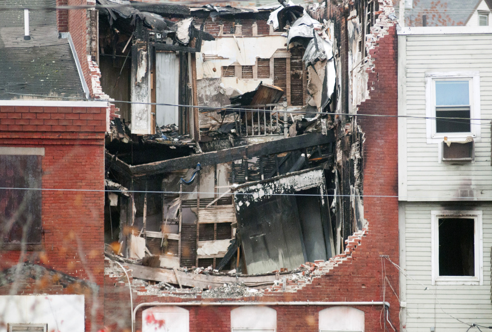 This October file photo shows the collapsed roof on 235 Water St. in Gardiner that was heavily damaged by a fire earlier in July.