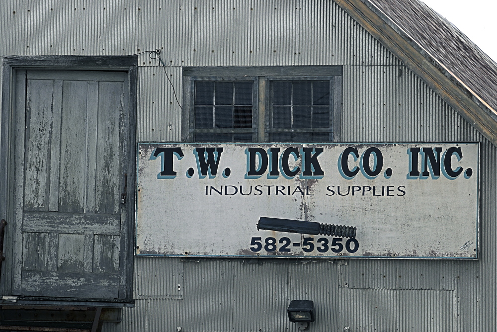 Gardiner officials received bids Friday from two developers who want to turn the former T.W. Dick  Co. building into medical offices.