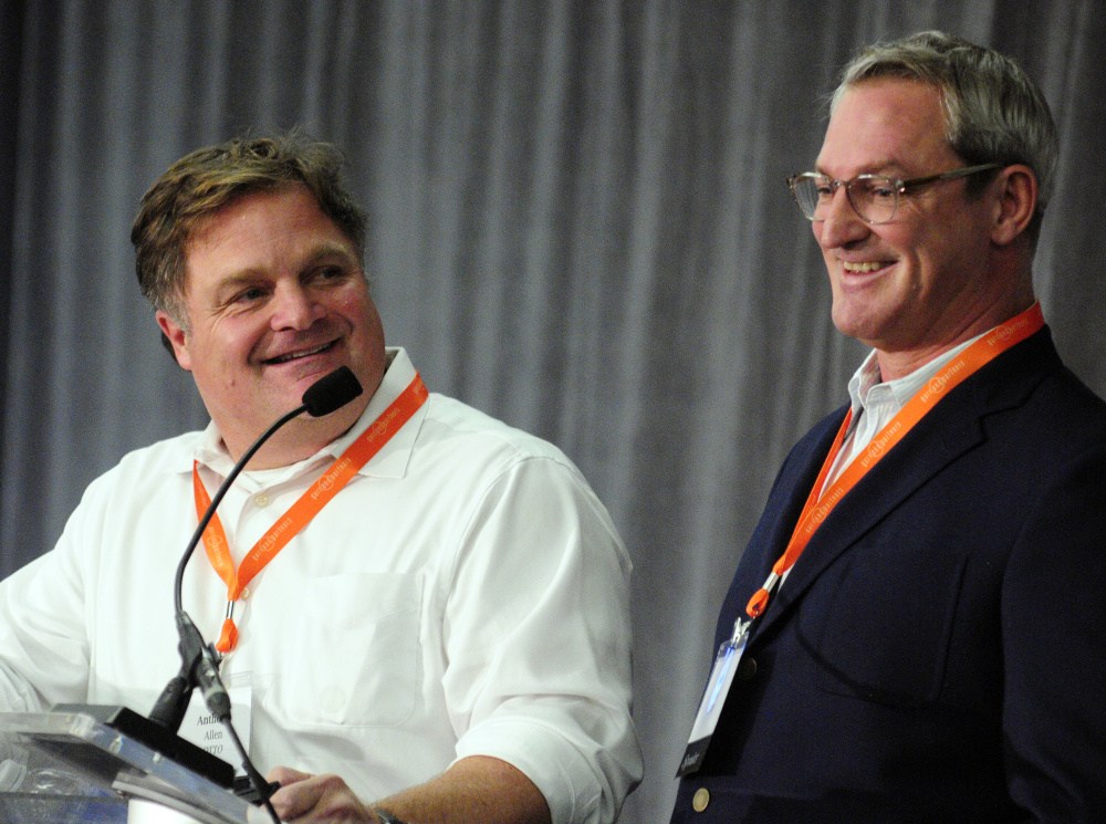 OTTO Pizza co-founders Anthony Allen, left, and Mike Keon give keynote address on Tuesday during the Mainebiz Momentum Convention at Augusta Civic Center.