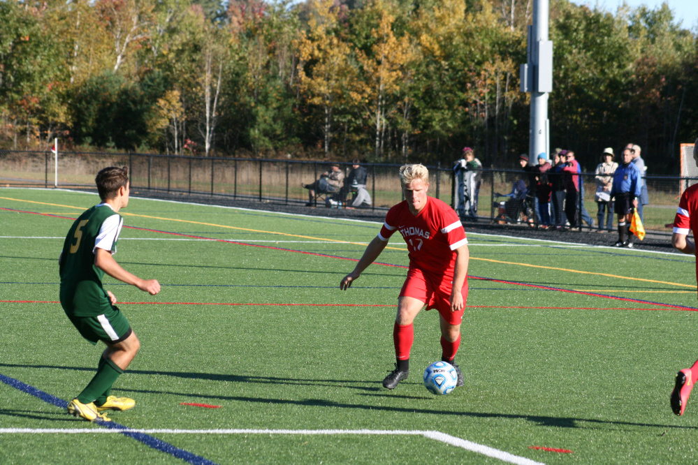 Thomas College’s Kyle Fletcher (17), of Monmouth, looks to get a shot off on goal in a game played earlier this season in Waterville.