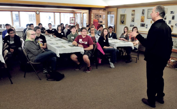 John Bear Mitchell speaks to students regarding Maine’s Wabanaki tribes on Thursday.