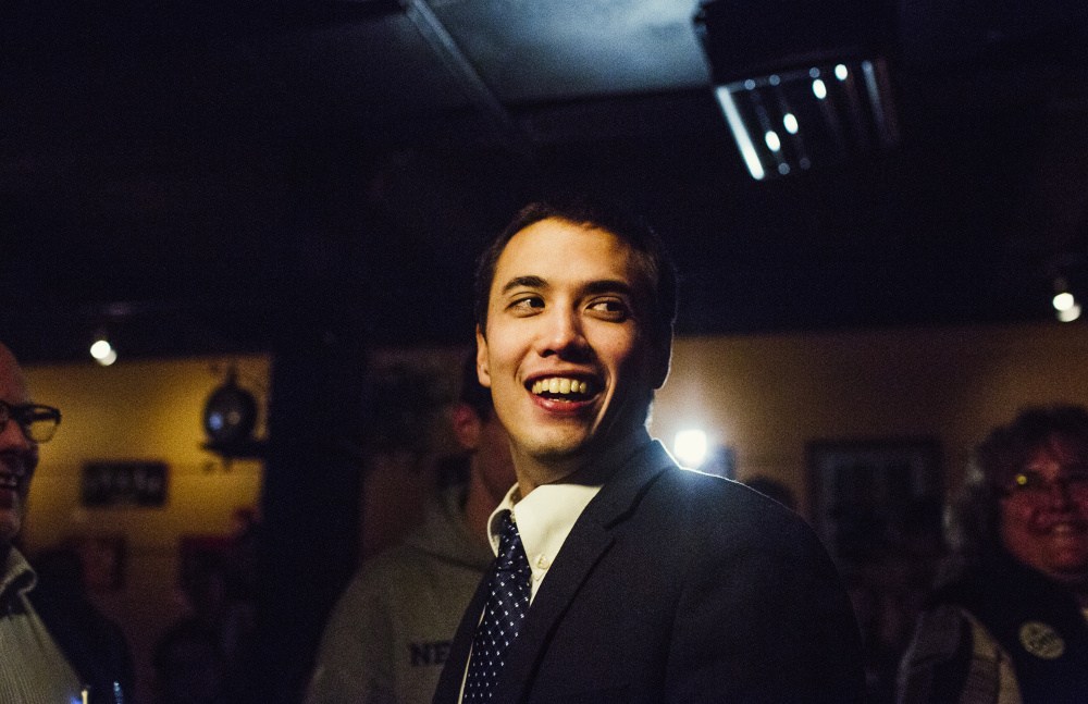 Lewiston Mayoral candidate Ben Chin reacts to applause from his watch party as he arrives at Guthries in Lewiston November 3.