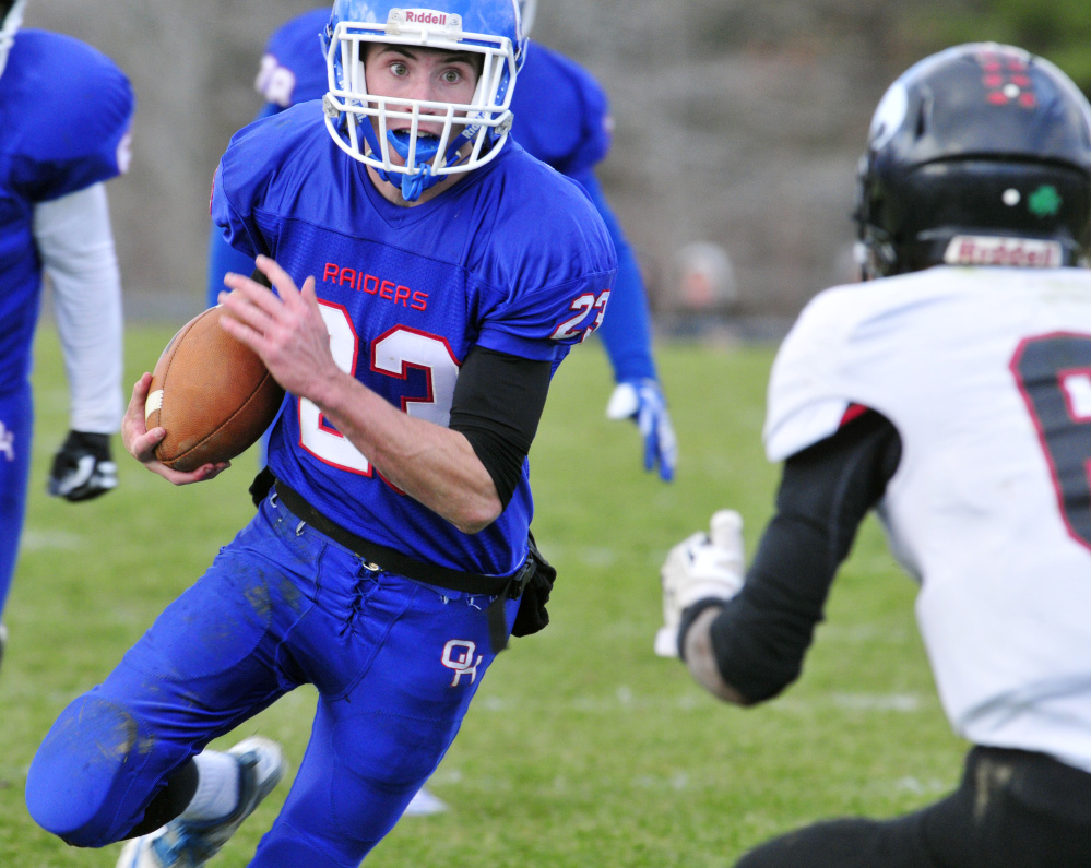 Oak Hill receiver Connor Nilsson heads up the field during the Campbell Conference Class D title game against Lisbon on Saturday in Wales.