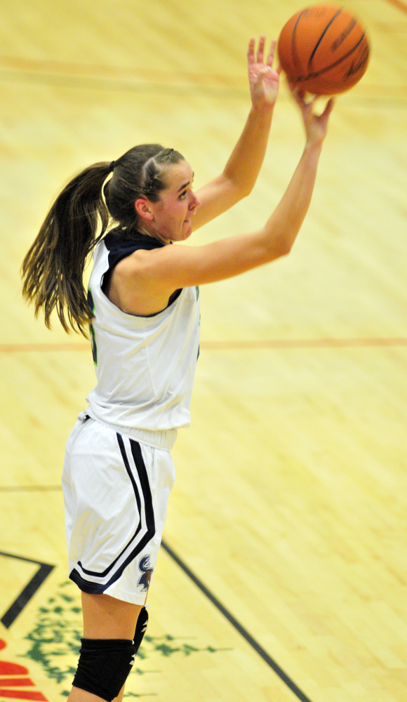 University of Maine at Augusta forward Jamie Plummer takes a shot during a game Thursday against Central Maine Community College in the Augusta Civic Center.