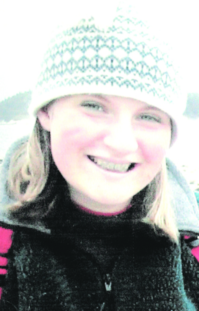 Marlee Johnston pictured during a beach cleanup in 2005 at Popham Beach.