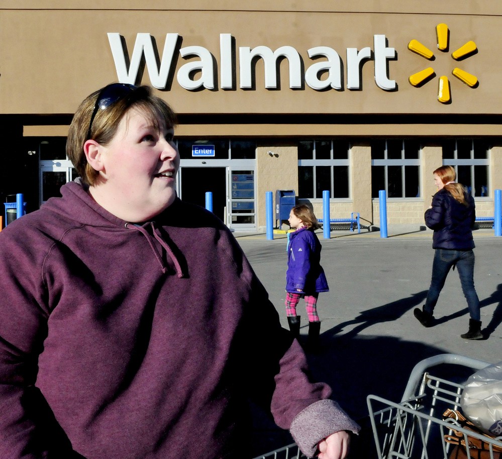 Amber Richardson speaks about the weekend bomb scares at Maine Wal-Mart stores after shopping at the store branch in Skowhegan on Sunday.