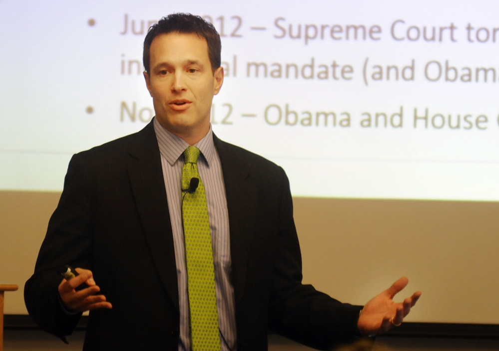 Jeff Lungren, health care lobbyist for the U.S. Chamber of Commerce, speaks Tuesday to members of the Maine Chamber of Commerce about health insurance at the Senator Inn in Augusta.