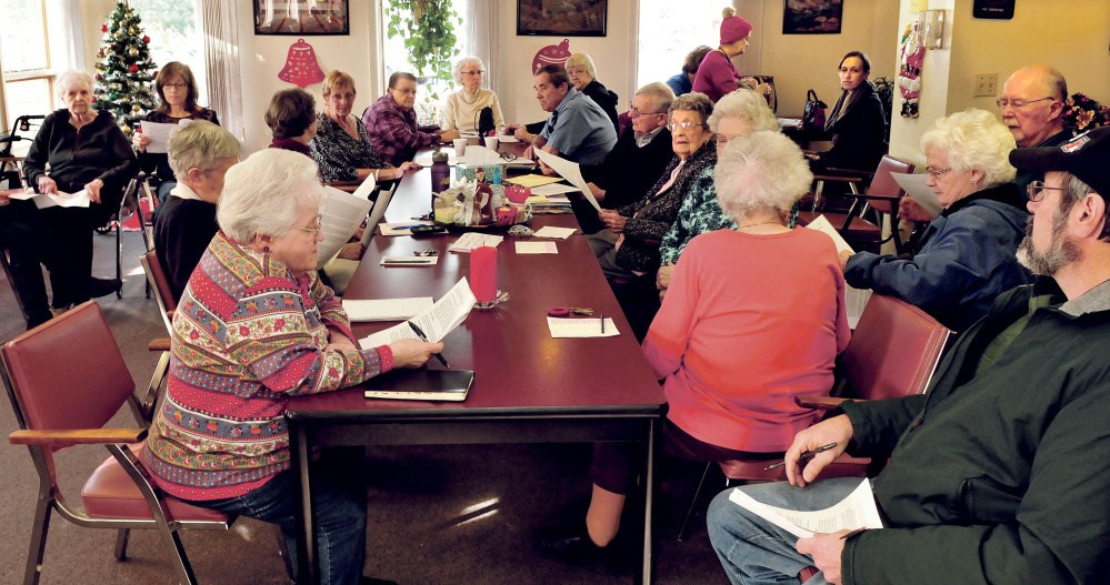 Residents of Springhouse Gardens apartments in Skowhegan gather for a meeting regarding foreclosure of the complex on Tuesday.
