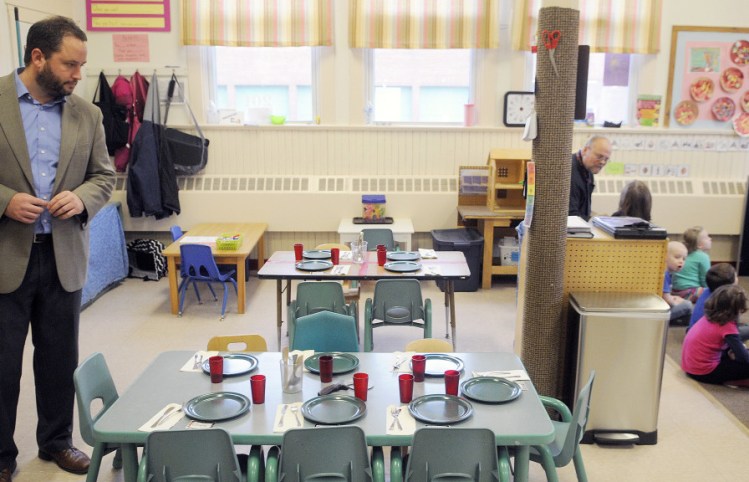 Augusta City Councilor Darek Grant tours a class at the Webster Head Start school in Augusta on Tuesday as part of his effort to combat childhood hunger and homelessness.