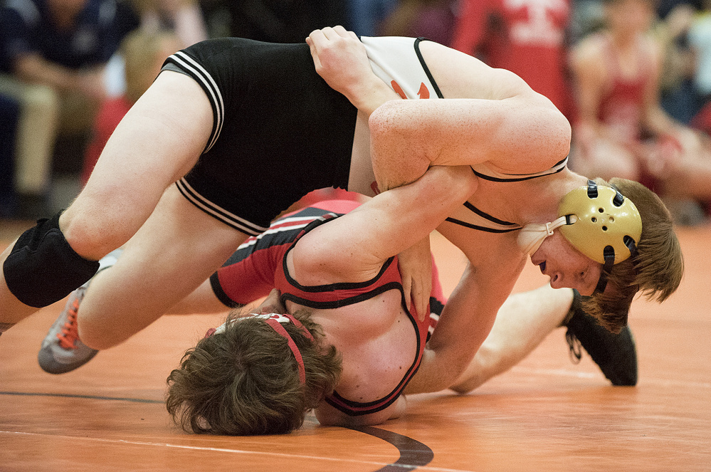 Gardiner’s Peter Del Gallo, top, defeats Cony’s Quinton Arbour during 126-pound semifinal action in the Tiger Invitational on Saturday in Gardiner.