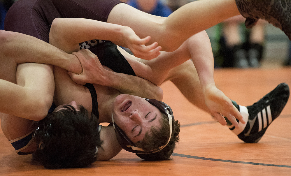 Nokomis’ Quinton Richards defeats Erskine’s Gabe Solorzano during 138-pound semifinal action in the Gardiner Invitational on Saturday in Gardiner.