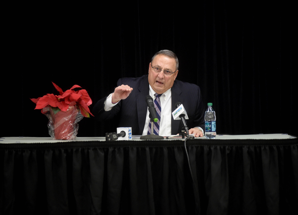 Gov. Paul LePage speaks to people assembled Thursday at Waterville Junior High School for a town hall meeting.