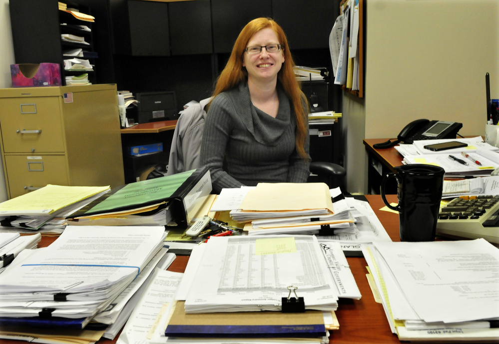 Skowhegan Town Manager Christine Almand at her desk Tuesday in the Municipal Building. Selectmen on Tuesday night agreed to extend her contract.