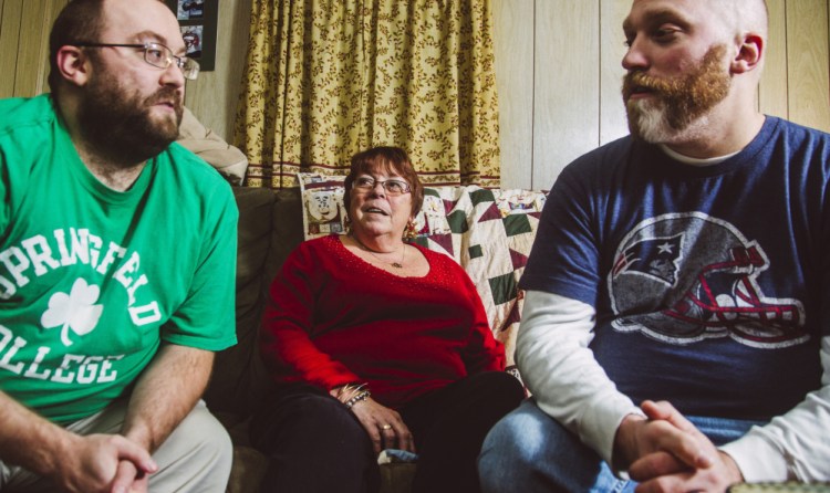 The Taylors, from left, Matt, Karen and Travis, discuss politics at their home in South Portland. The brothers are split on the merits of presidential candidate Donald Trump, while their mom just wants to keep things civil.