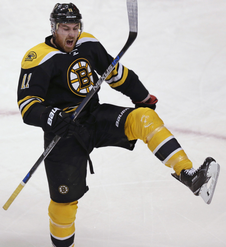 Bruins right wing Jimmy Hayes celebrates his goal against Senators goalie Craig Anderson in the first period Tuesday night. Hayes scored three goals in the Bruins’ 7-3 win.