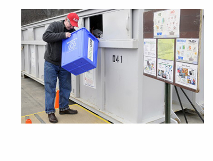 Superior Court Justice and former Augusta Mayor Bill Stokes recycles items Thursday at the recycling station at Augusta Public Works. (Staff photo by Andy Molloy)