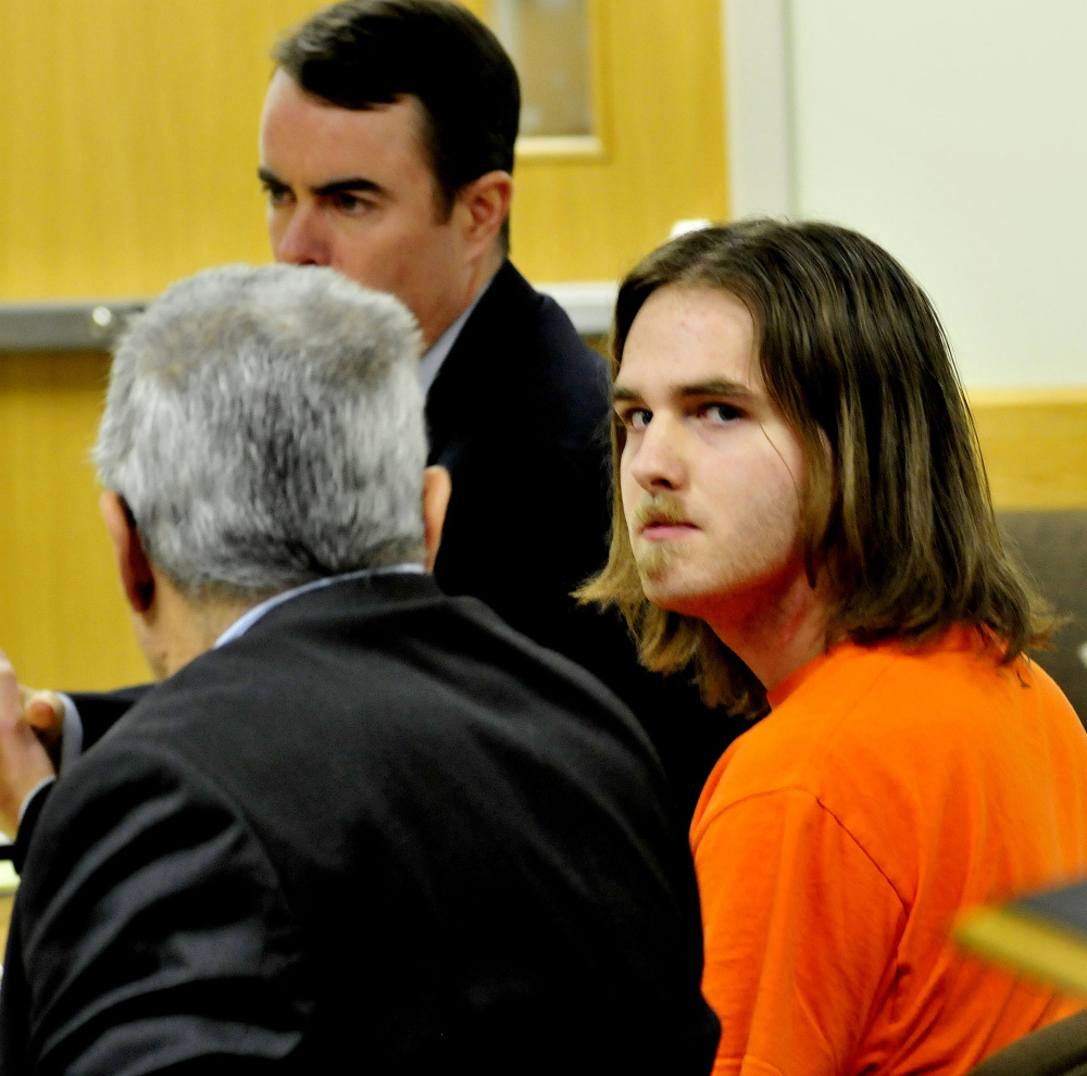 Defendant Dana Craney looks around Farmington District Court on Monday as attorneys discuss a prison sentence after Craney pleaded guilty to killing his grandmother, Joanne Goudreau, on Dec. 20, 2014. Attorney Walter Hanstein is at left.