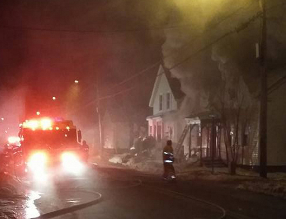 A home at 144 Water St. in Waterville burns on Jan. 4. The fire, sparked by an electrical problem, forced the three-generation family that rented the house to move into a motel. While they’re grateful to Waterville for the help they’ve received, the Brunsons are moving back to South Carolina, having lived in Maine for three months.