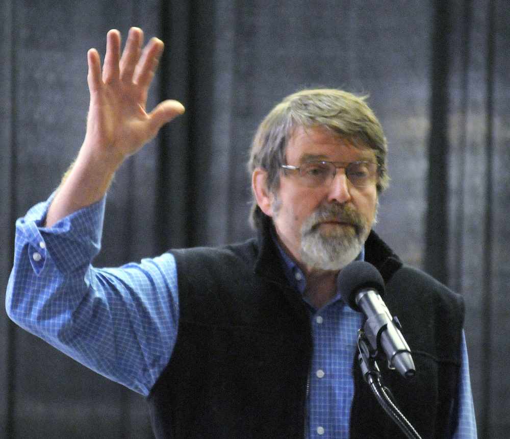 Henry “Skip” Gates, of Skowhegan, encourages people attending a forum about drugs to intervene with their children on Monday night at Cony High School in Augusta. Gates' son, Will, died of an overdose after snorting heroin while in college in 2009.