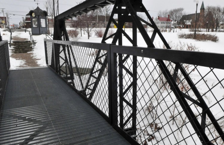The Head of Falls section of Waterville as seen from the Two Cent Bridge, where the city is considering a new public boardwalk.