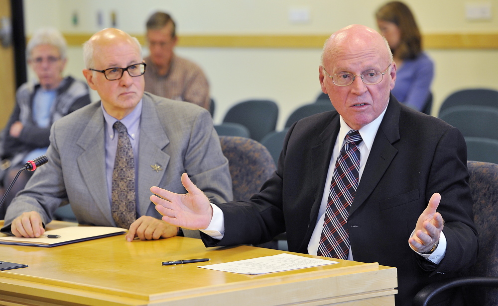 Jay Harper, left, superintendent at Riverview, listens as Judge Dan Wathen, court master, responds to a question at a previous hearing before a legislative committee.