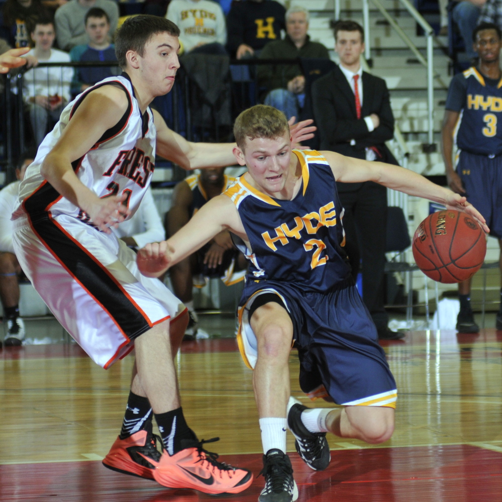 Staff file photo by Joe Phela 
 Forest Hills junior guard Aaron Moffitt, left, guards Hyde senior guard Keifer Cundy during the Western D championship game last season at the Augusta Civic Center.