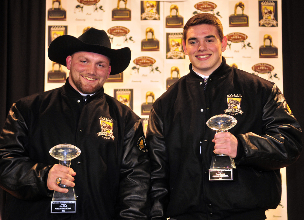 Alec Clark, of Winslow, left, and Frank Curran, of Cheverus, pose with their Frank J. Gaziano awards Saturday at the Augusta Civic Center.