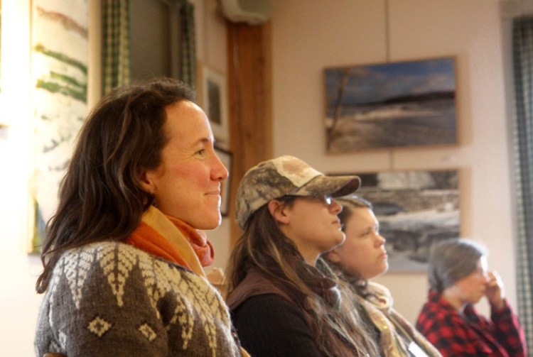 Dalziel Lewis, of Hallowell, listens to a session titled “Scaling Up Your Farmers’ Market Business” at the Maine Farmers’ Market Convention at Maple Hill Farm Inn and Conference Center in Hallowell on Sunday.
