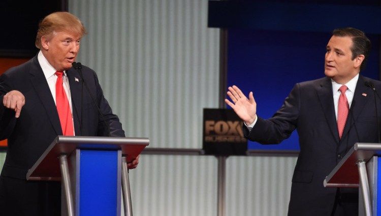 Donald Trump speaks and Sen. Ted Cruz, R-Texas, responds during Thursday night’s Republican presidential debate in North Charleston, S.C.