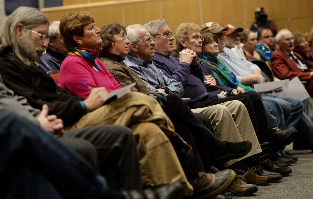 The crowd listens as Gov. Paul LePage speaks at Windham High School.