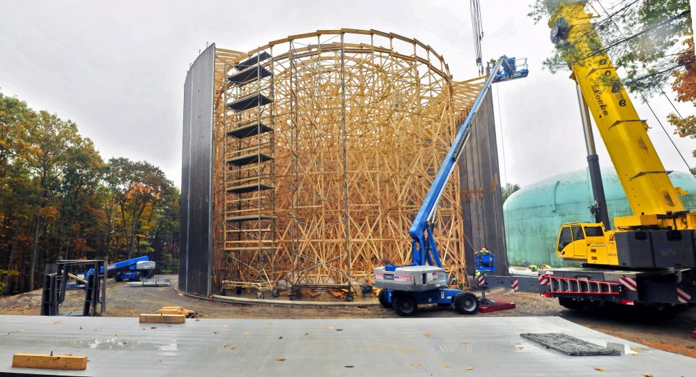 Workers for Preload Inc. build a new 2.6-million-gallon drinking water storage tank for the Greater Augusta Utility District behind the former Hodgkins Middle School in Augusta in October 2014.