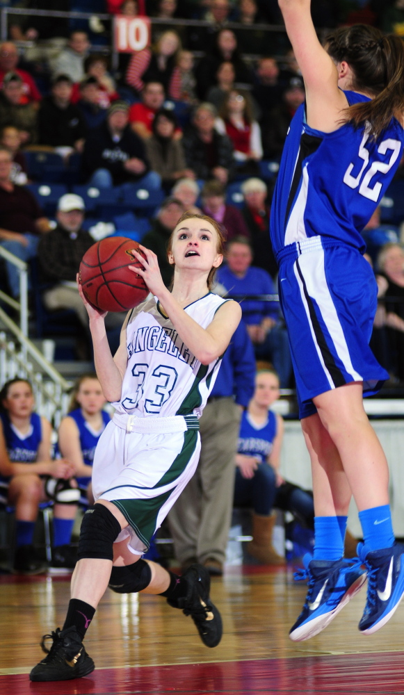 Rangeley’s Maddison Egan looks to shoot around Searsport’s Melinda Ogden during a Western D semifinal last season at the Augusta Civic Center. Rangeley, now playing in Class D South, is the favorite to win this year’s bracket.