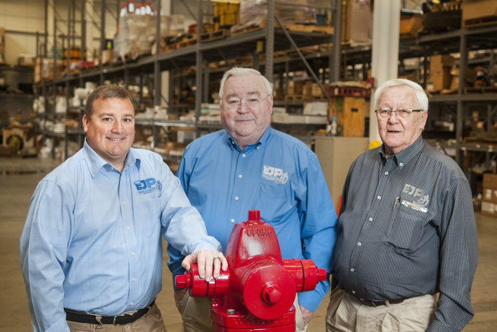 President Steven Prescott, left, Chief Executive Officer Peter Prescott and Chief Operating Office Stanley McCurdy on Thursday at E.J. Prescott headquarters in Gardiner.