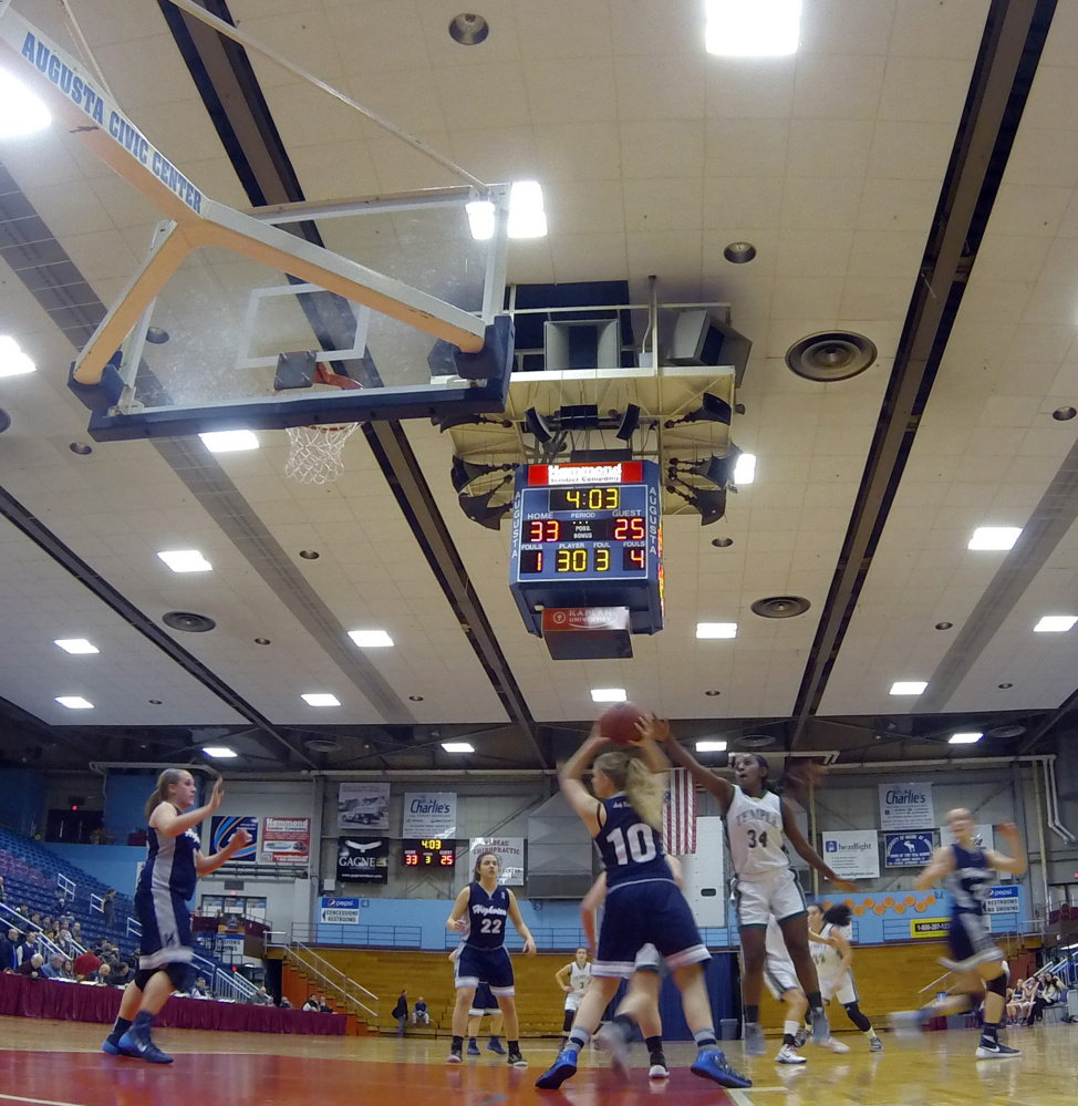 Highview Christian’s Chloe Eckstein tries to get past Temple Academy’s Selam Heinrich during a Class D South quarterfinal Wednesday morning at the Augusta Civic Center.