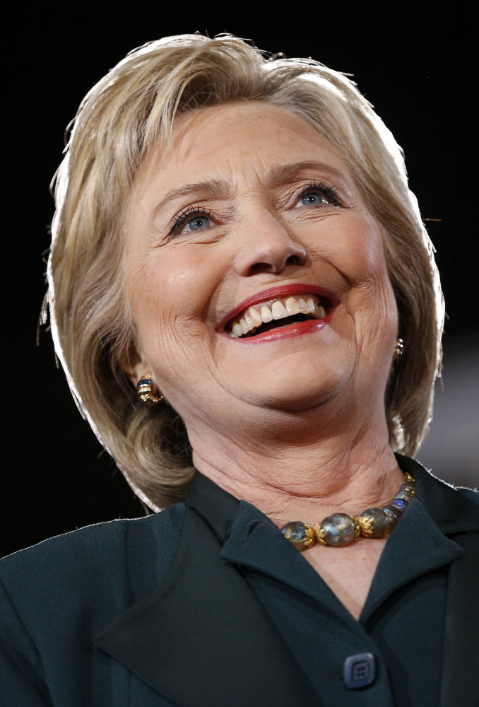 Democratic presidential candidate Hillary Clinton stands on stage during a rally Friday, Feb. 19, 2016, in Las Vegas. (AP Photo/John Locher)